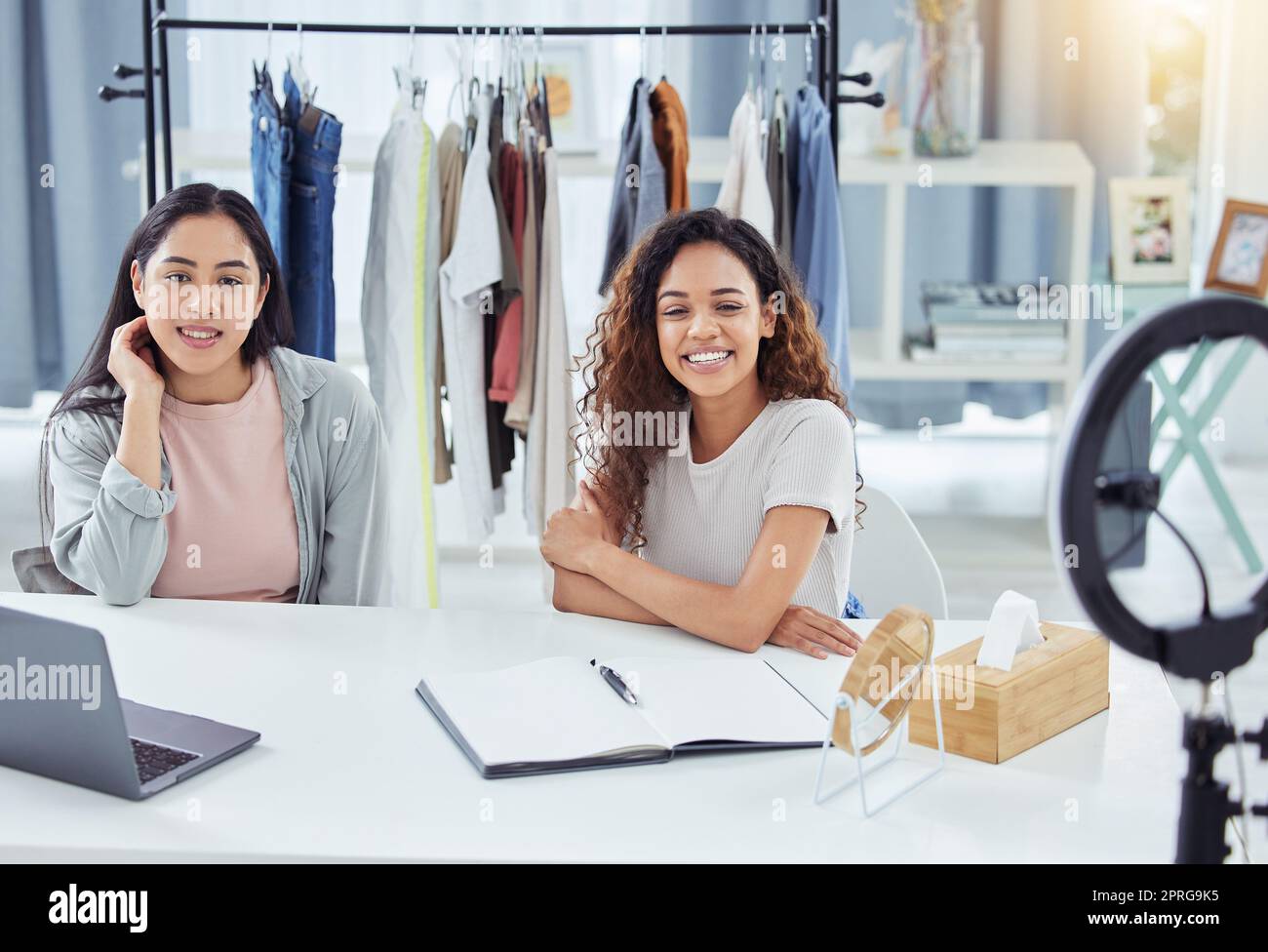 Social media influencers and fashion design podcast by young content creators live streaming, vlogging and talking. Friends, designers and lifestyle blog women happy to broadcast and review clothes Stock Photo