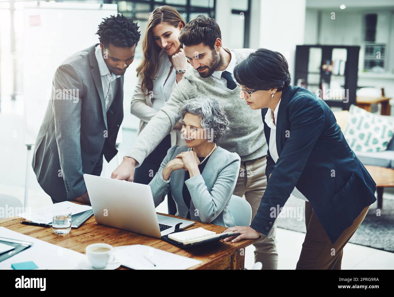 We make decisions together. a corporate business team having a meeting in their office. Stock Photo
