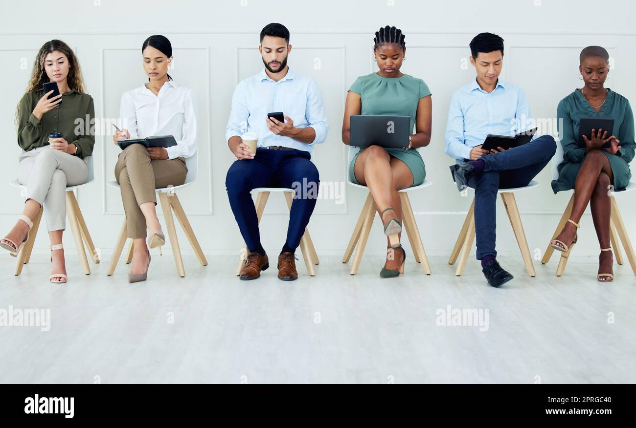 Business people waiting for interview, workers and employees working on technology in line in