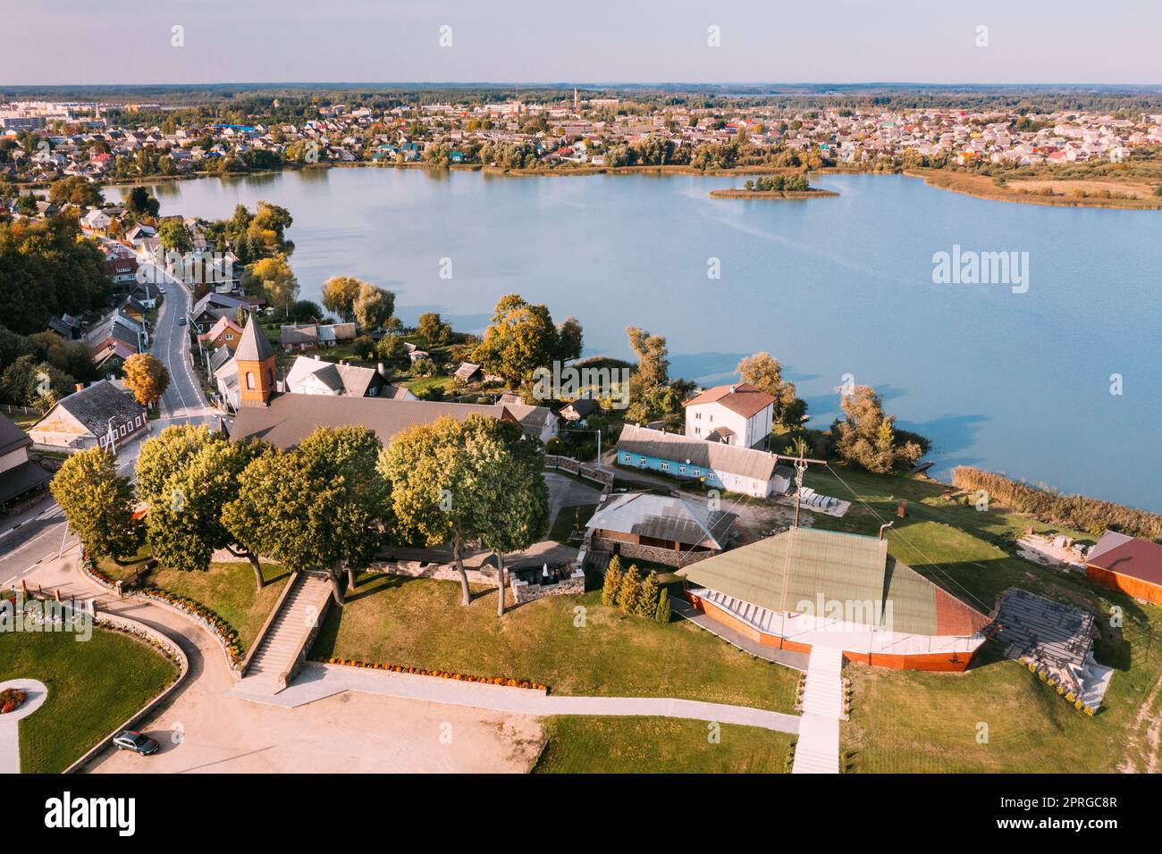 Braslav, Braslaw District, Vitebsk Voblast, Belarus. Aerial View Of Church of the Nativity of the Virgin Mary. Novyaty Lake Stock Photo