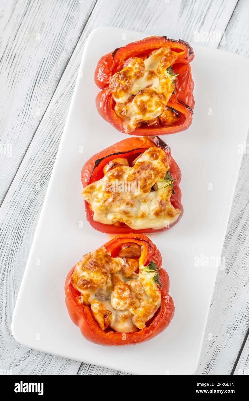 Baked bell peppers stuffed with sausage Stock Photo Alamy
