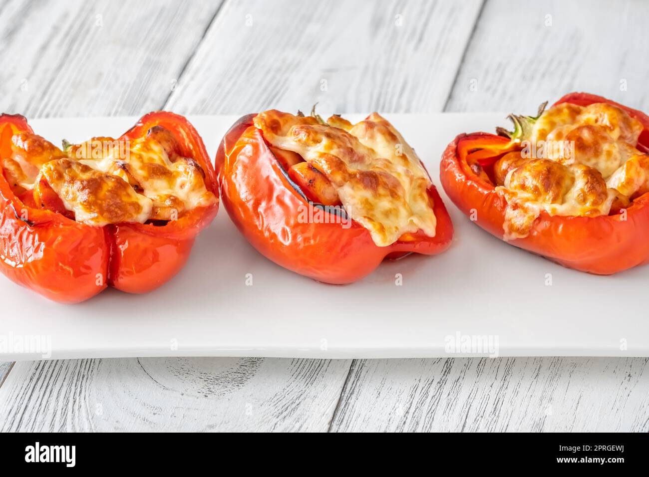 Baked bell peppers stuffed with sausage Stock Photo Alamy