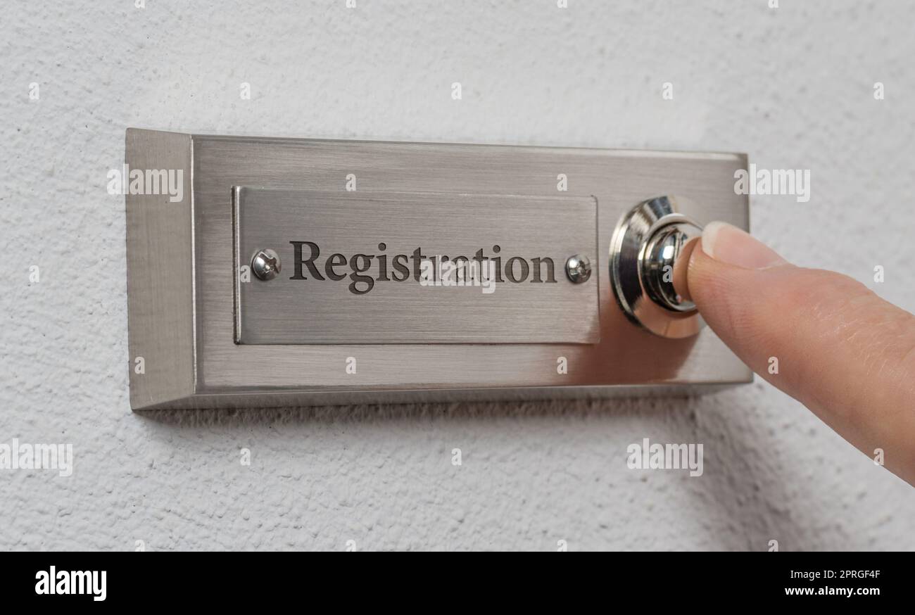 Doorbell sign with the engraving Registration Stock Photo