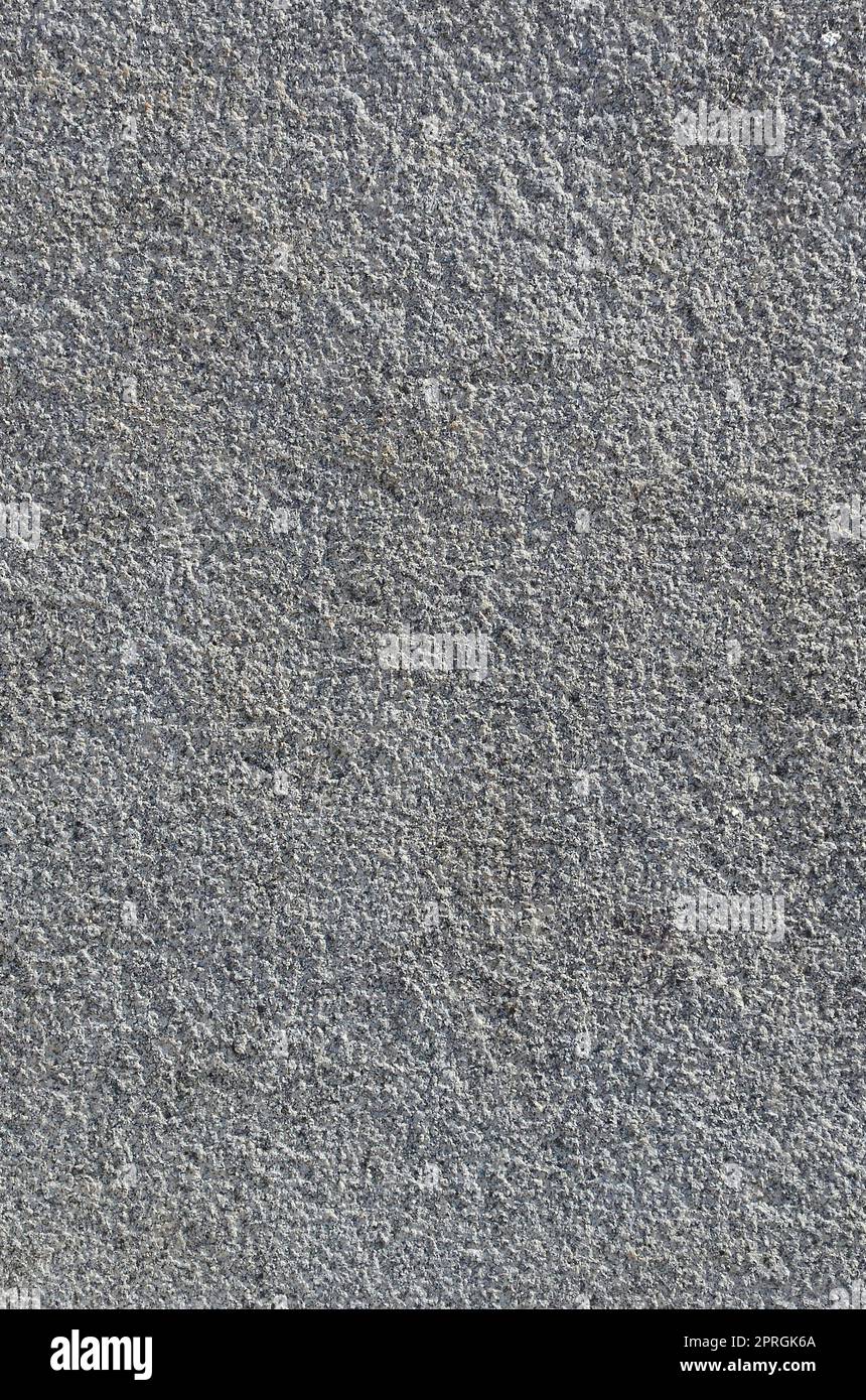 Texture of rough concrete wall with embossed texture. Smooth gray surface Stock Photo