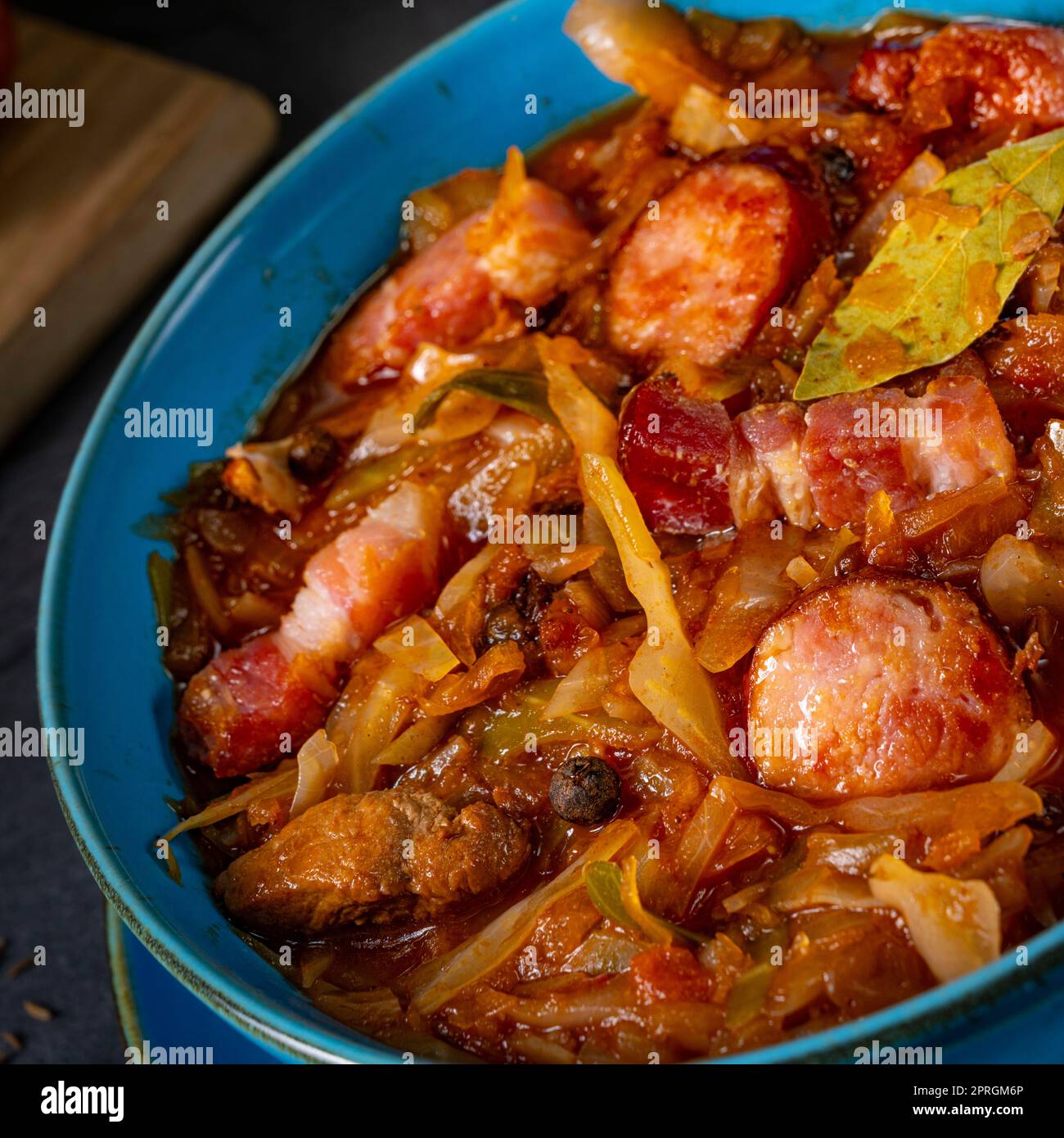 Polish bigos with sausage and mushrooms Stock Photo - Alamy