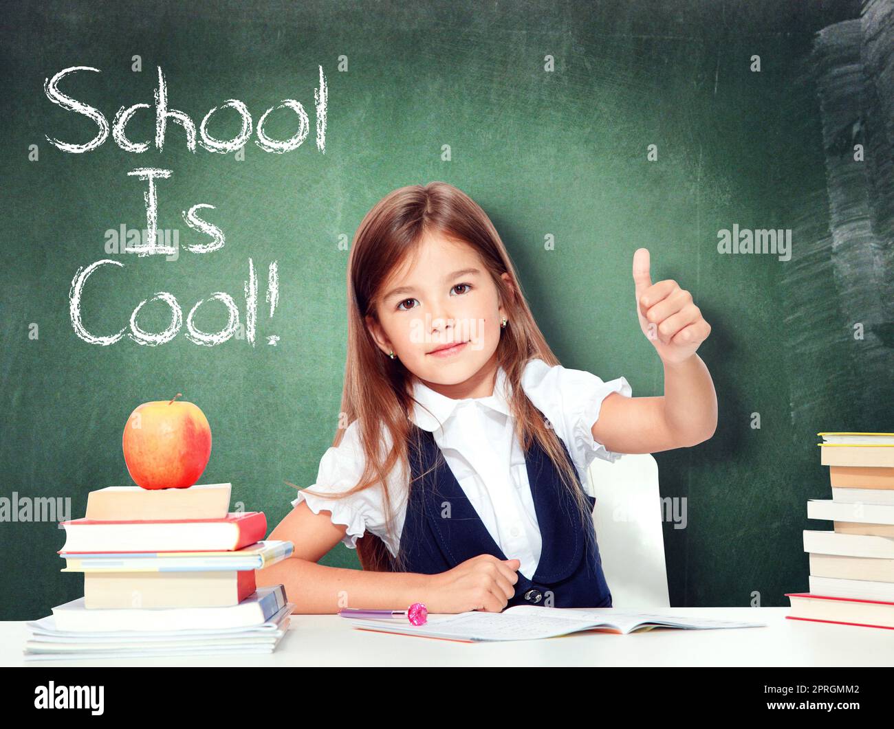 Happy and cute teen school girl showing thumbs up Stock Photo - Alamy