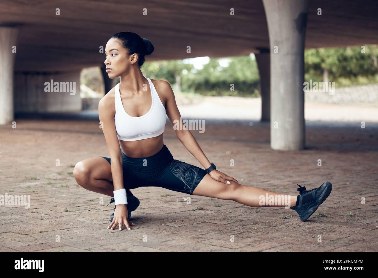 Sports woman stretching legs, outdoor fitness workout in city street and  healthy lifestyle in Brazil. Training body for park exercise, young athlete  g Stock Photo - Alamy