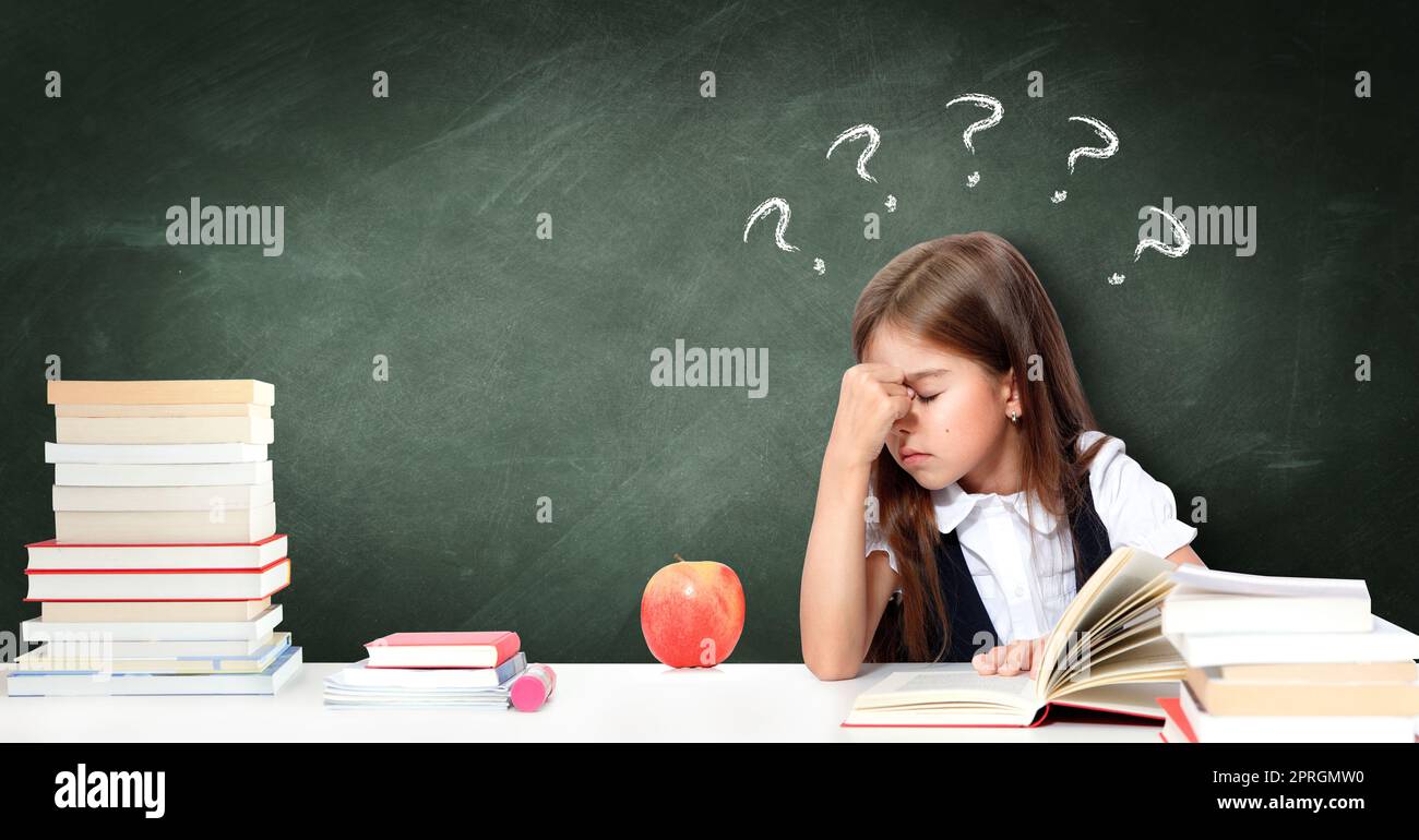 Frustrated and unhappy teen girl at school. Stock Photo