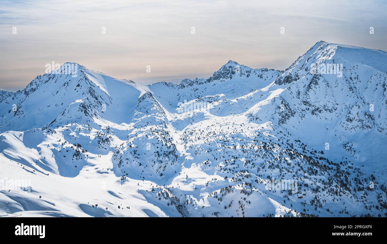 Snow capped mountain peaks of mountain range in Pyrenees Mountains