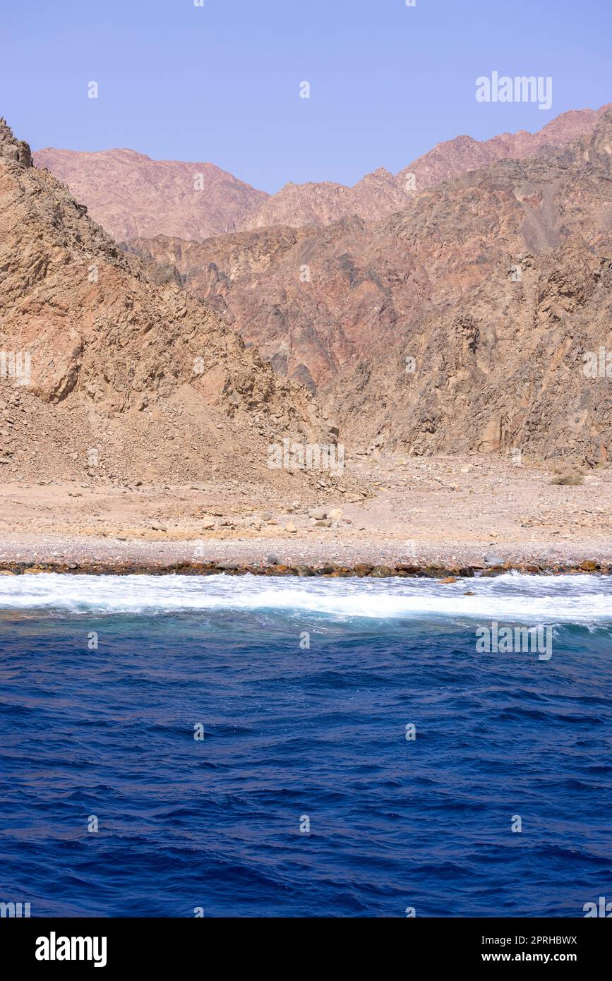 The Red Sea on the Gulf of Aqaba, surrounded by the mountains of the Sinai Peninsula, Dahab, Egypt Stock Photo