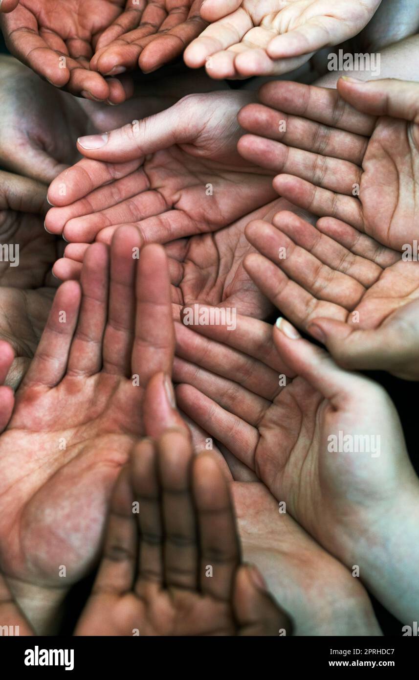 Hand Held Out For Help Unity Concept held together hi-res stock photography and images - Alamy