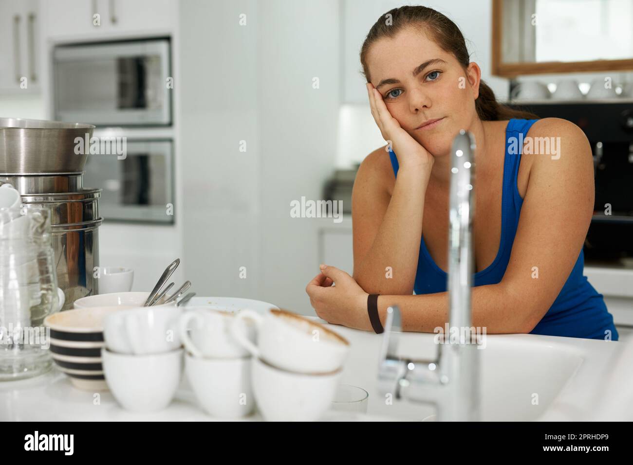 Women washing cooking utensils hi-res stock photography and images - Alamy