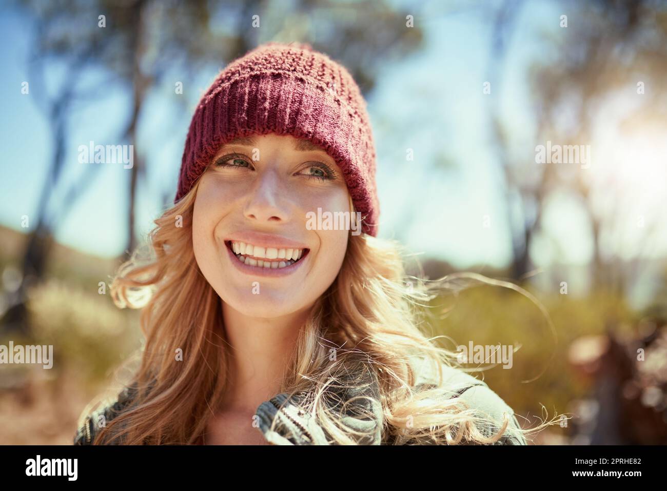 She loves being out here. a young woman hiking. Stock Photo