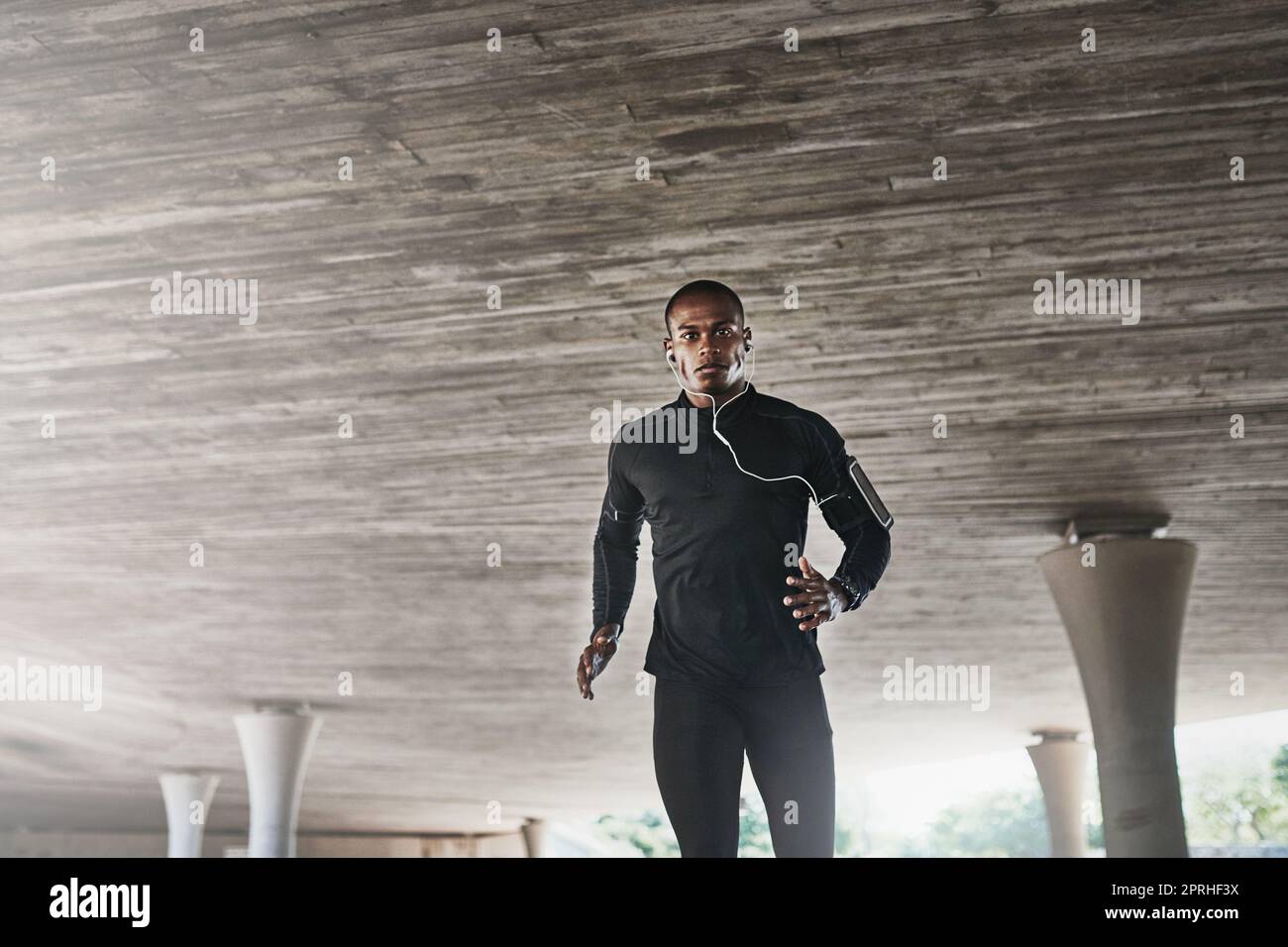 The city is my gym. a young person working out in and around the city. Stock Photo