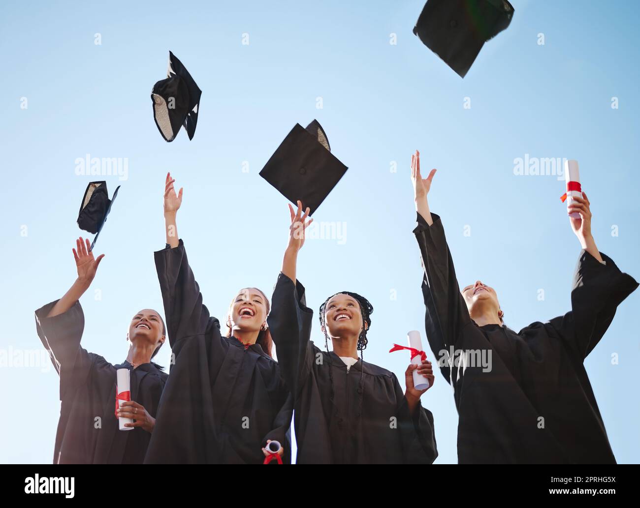 Graduation, students and education goal success celebration with happy