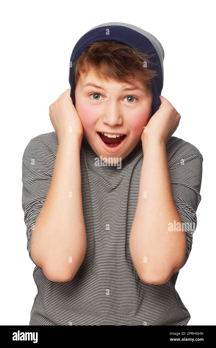 Oh wow. A teenage boy pulling his beanie over his ears while screaming Stock Photo Alamy
