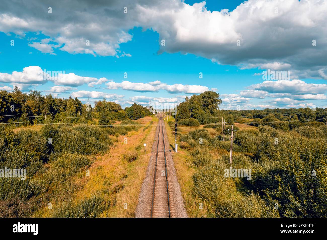 Aerial view of railway track through countryside Stock Photo