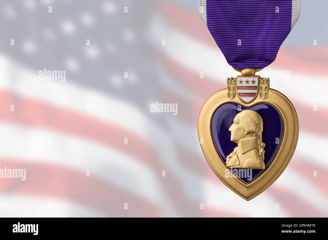 Purple Heart Miltary Merit Medal Against Ghosted American Flag Stock Photo