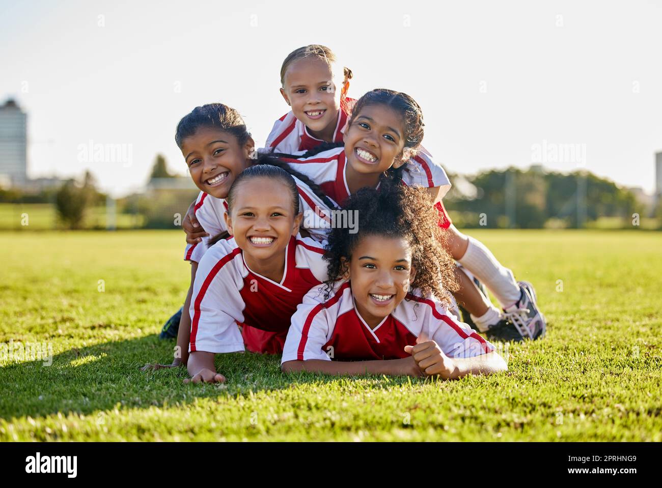 Soccer, training and children on sports field for football game