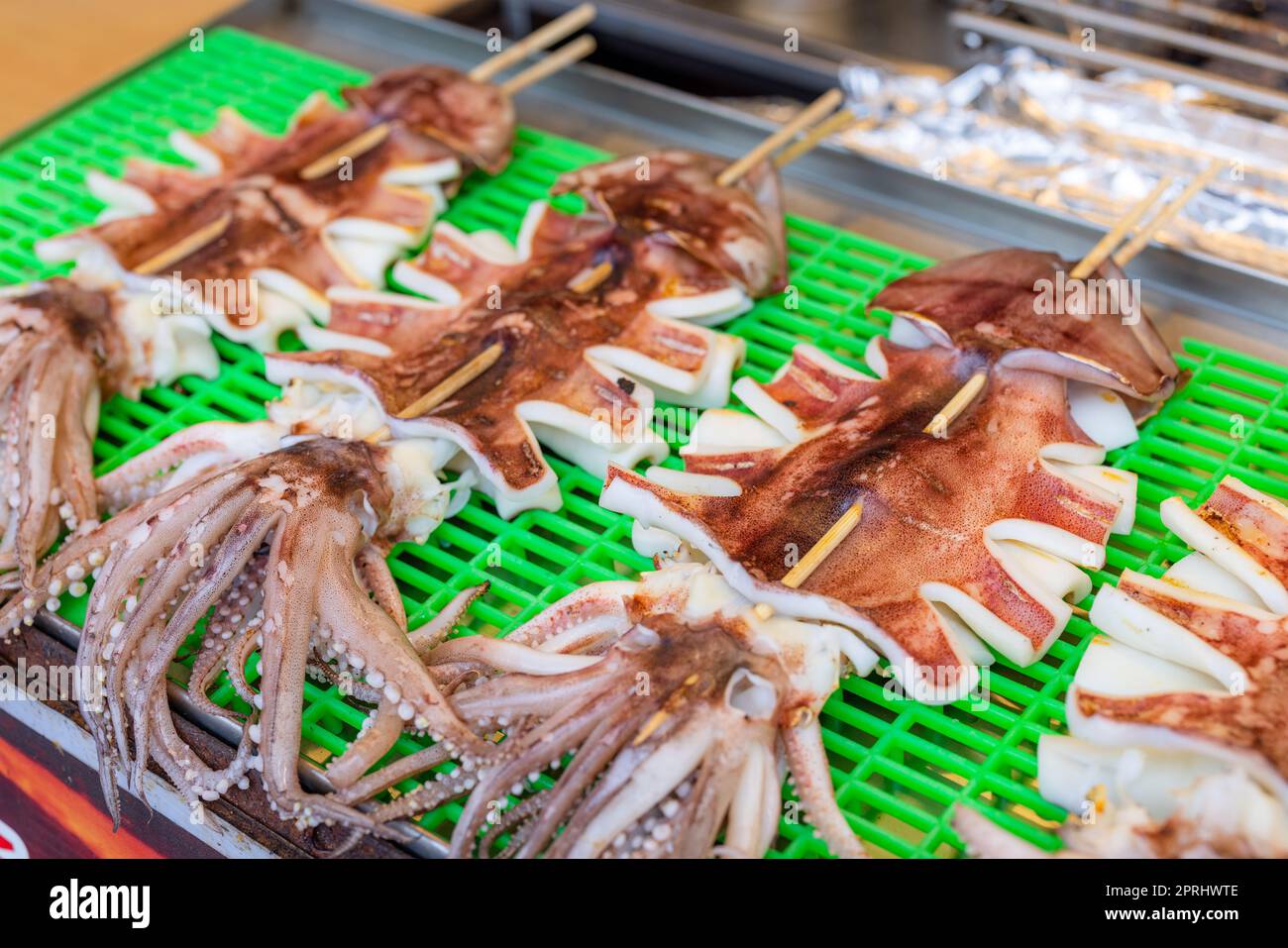 Grill squid in street market of Taiwan Stock Photo - Alamy