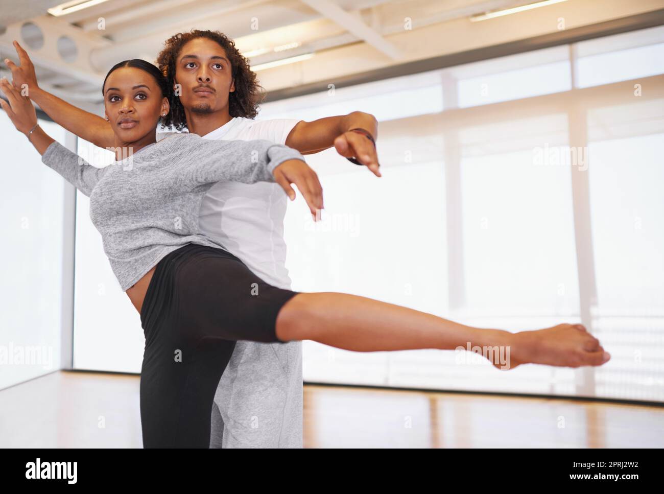Their bodies one on the dance floor. two young dancers