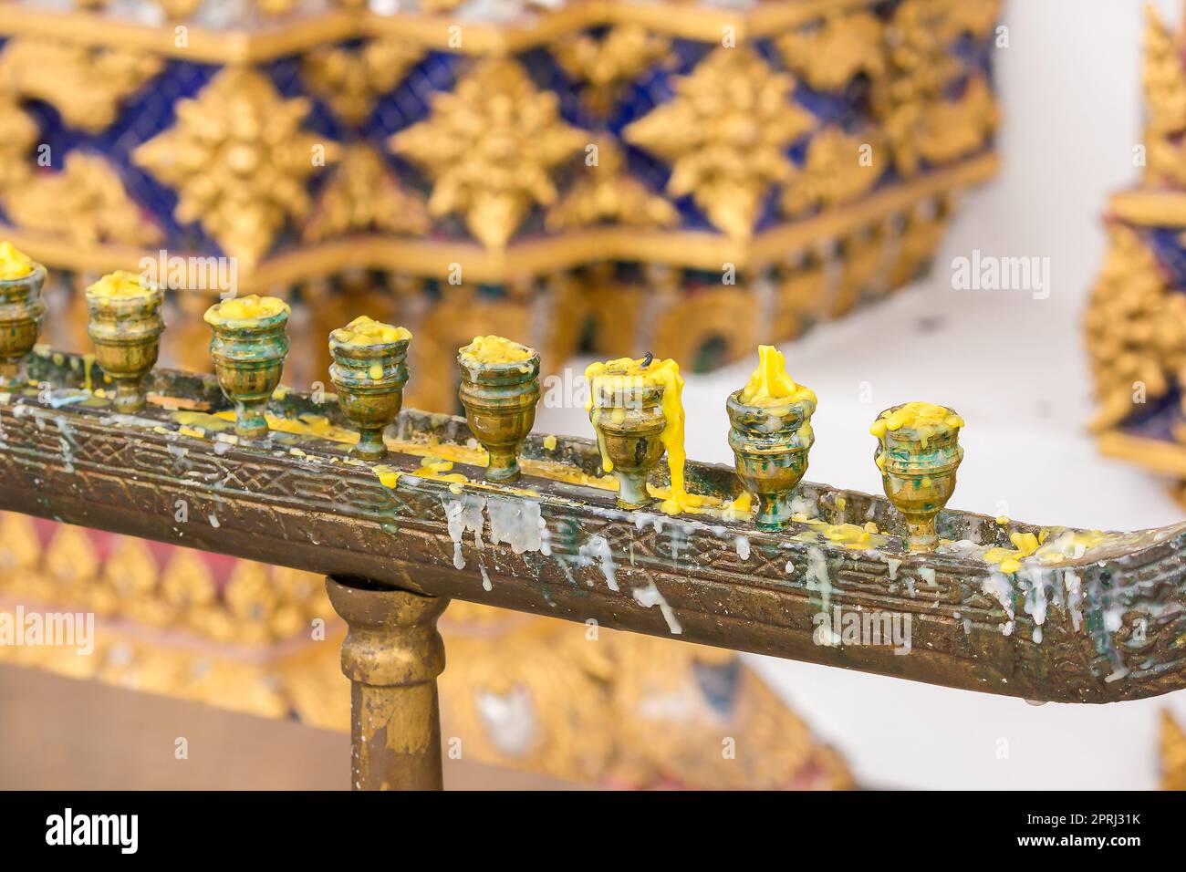 Candlestick in temples that have been used Stock Photo Alamy