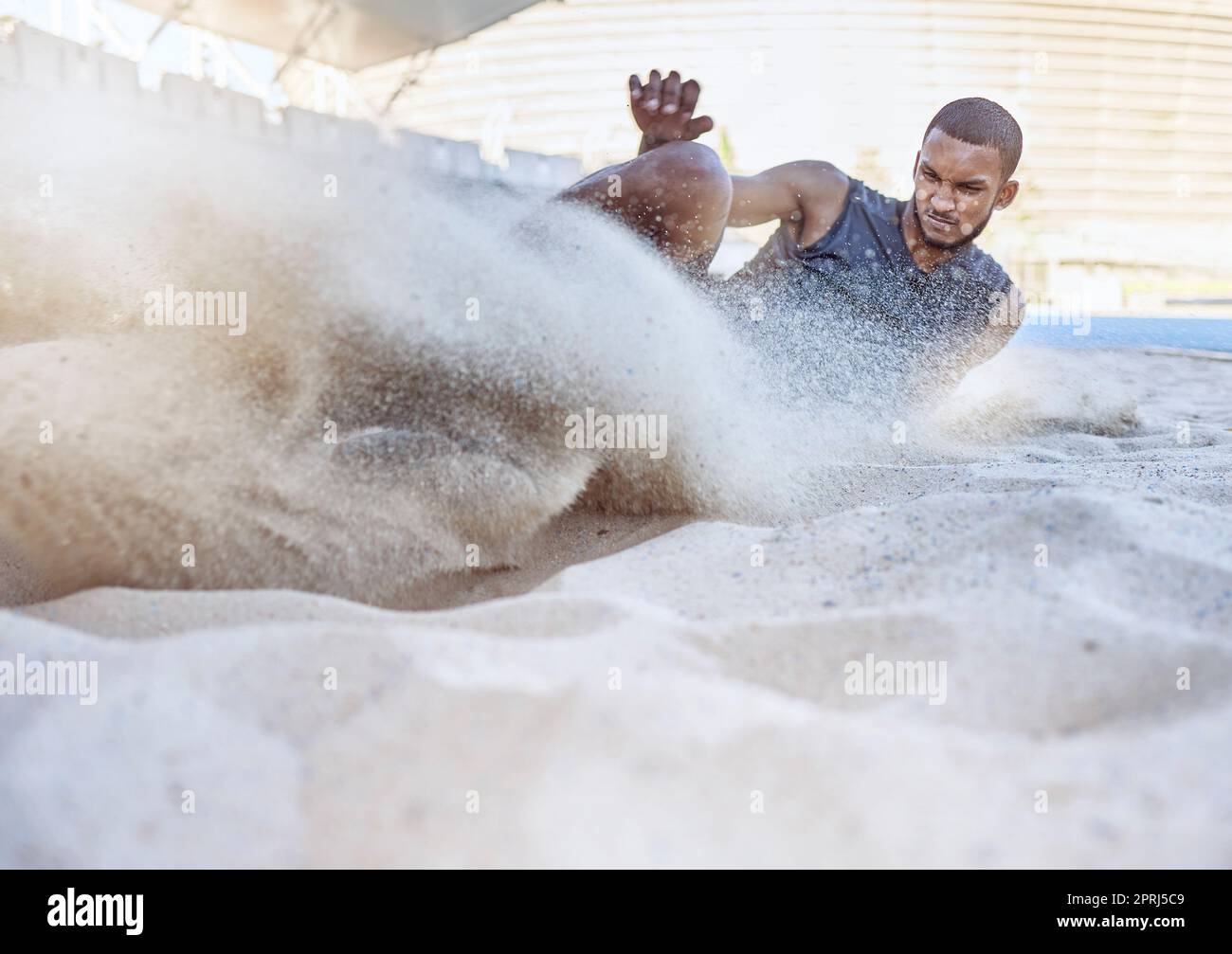 Man, athlete and sand for long jump, sport and training for sports