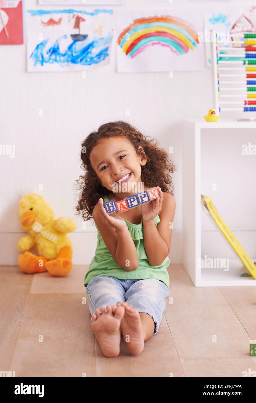 The building blocks of learning. a cute little girl playing with