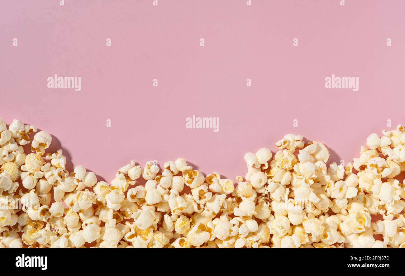 Popcorn placed on white background with copy space. Stock Photo