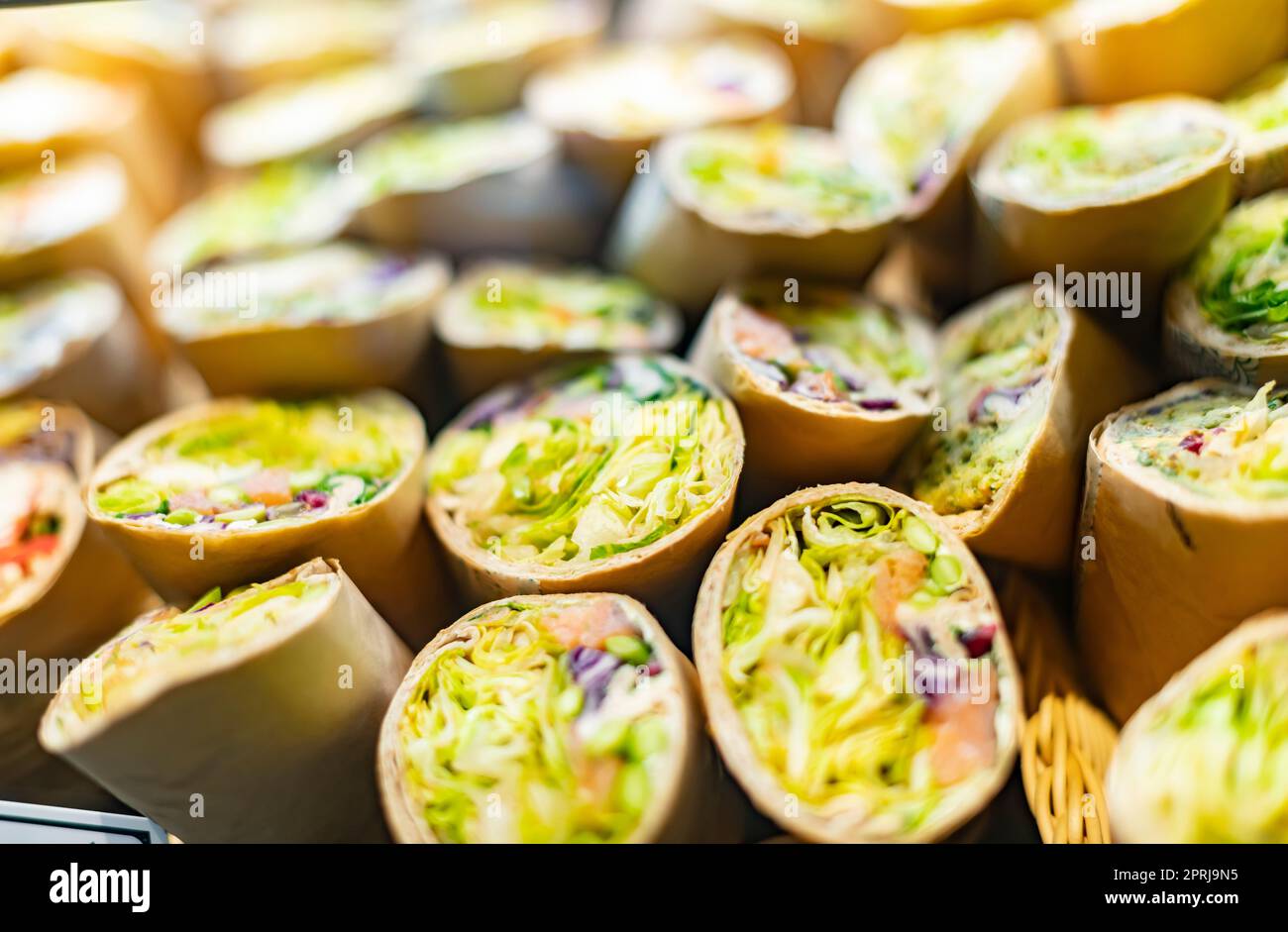 Freshly prepared tortilla wraps sold in a fast food restaurant Stock