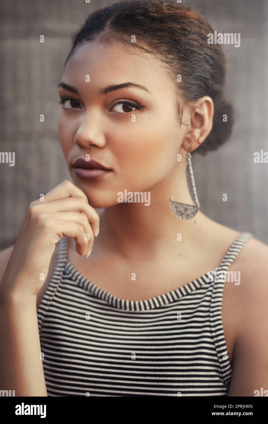 She wears her confidence like a badge of honour. Cropped portrait of a beautiful young woman. Stock Photo
