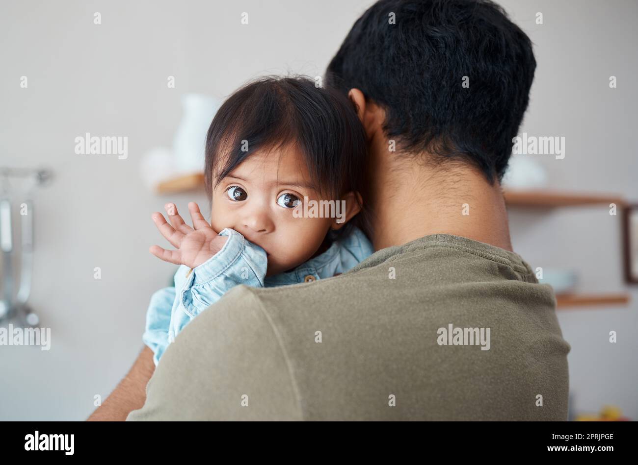 Love, care and down syndrome baby with father bonding, relax and enjoy