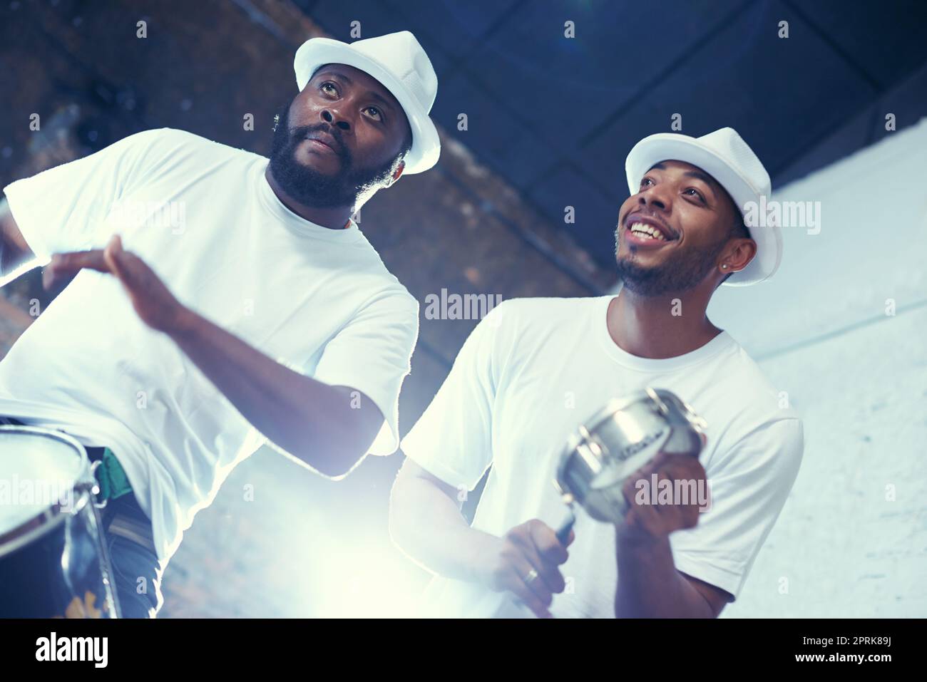 Feeling those Brazillian beats. a band playing their percussion instruments in a Brazilian setting Stock Photo