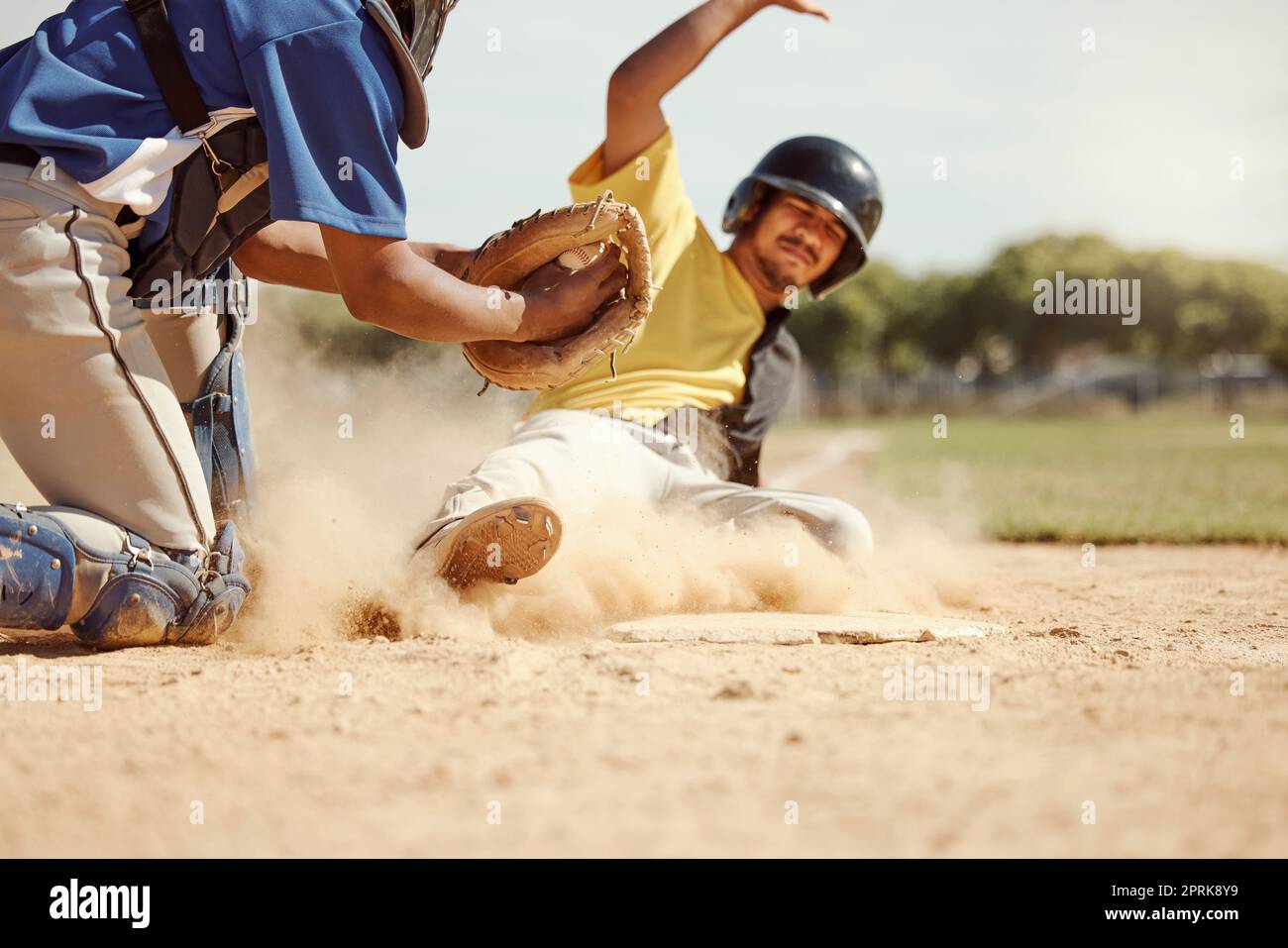 Baseball player, run and slide in dirt for game, contest or match on