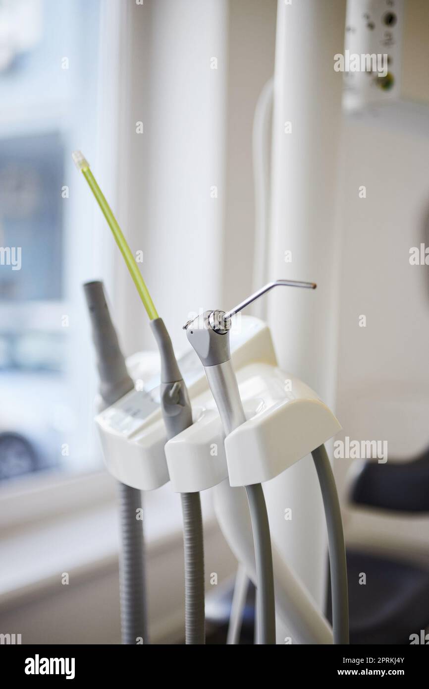 Dental instrument in stomatology clinic. Close up compressed nozzle air