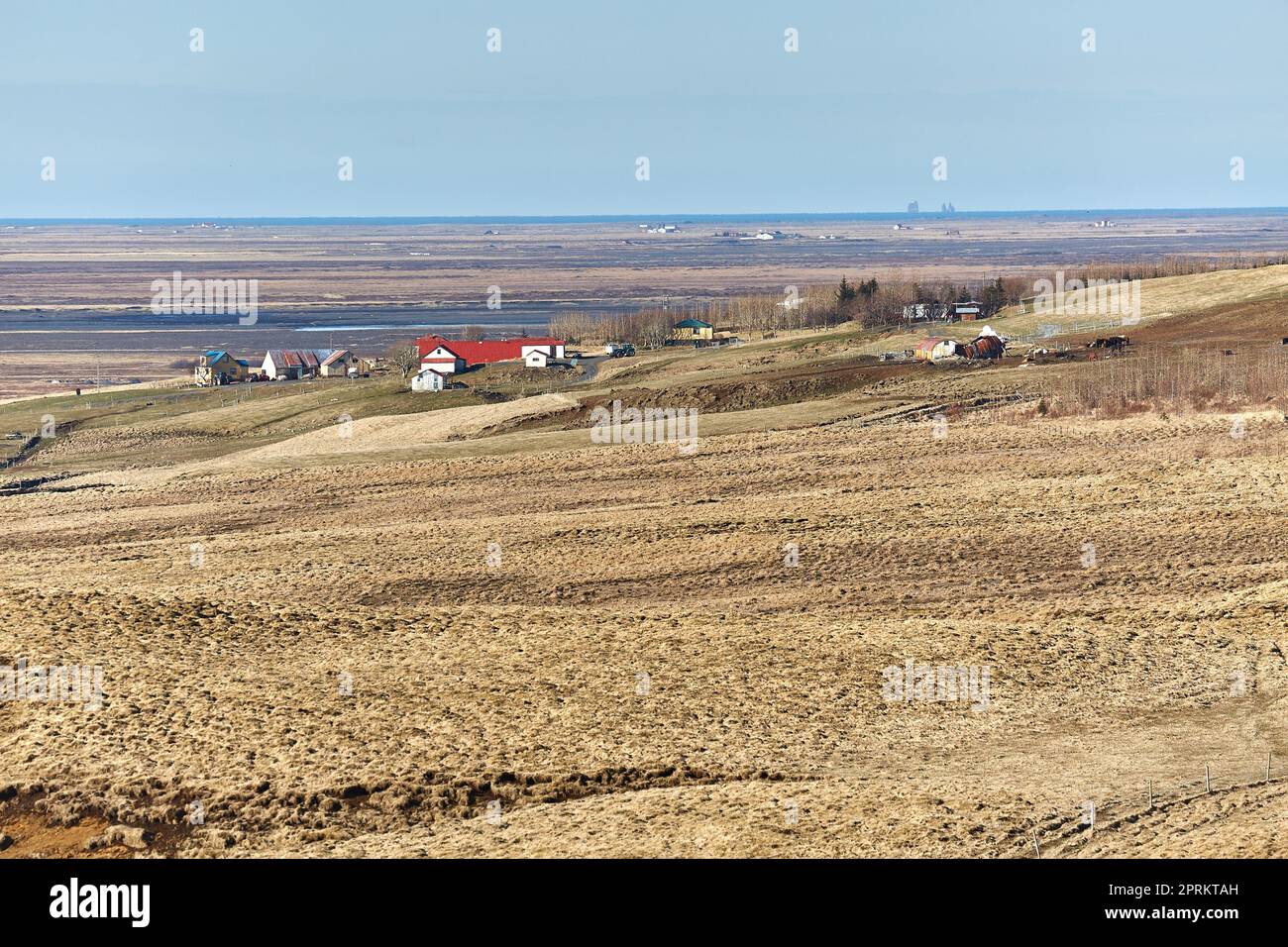 Icelandic plain landscape with farmland and heat haze in the air Stock