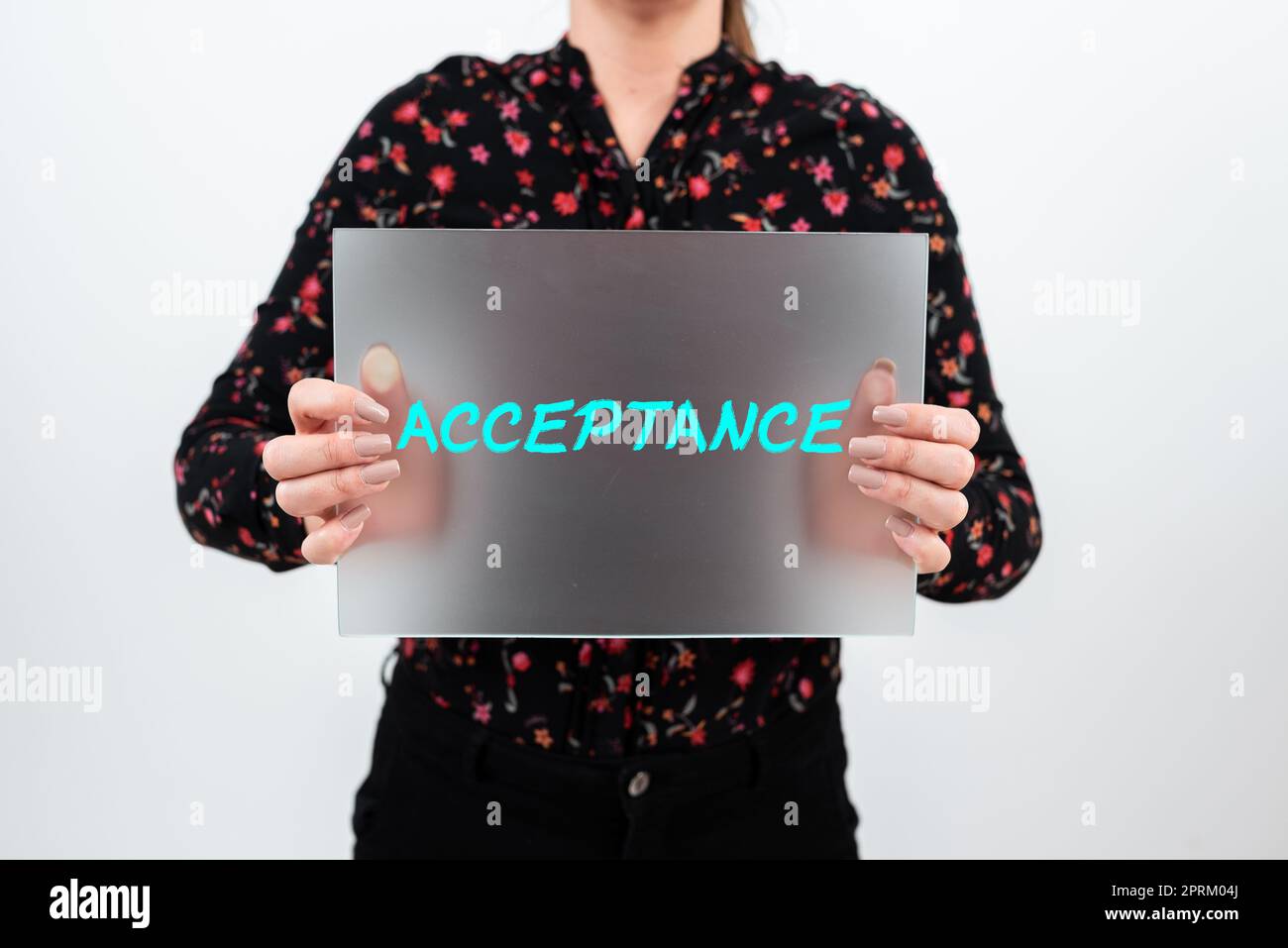 Text showing inspiration Acceptance, Business overview a condition or a person producing or showing no symptoms Woman Showing Placard And Presenting I Stock Photo