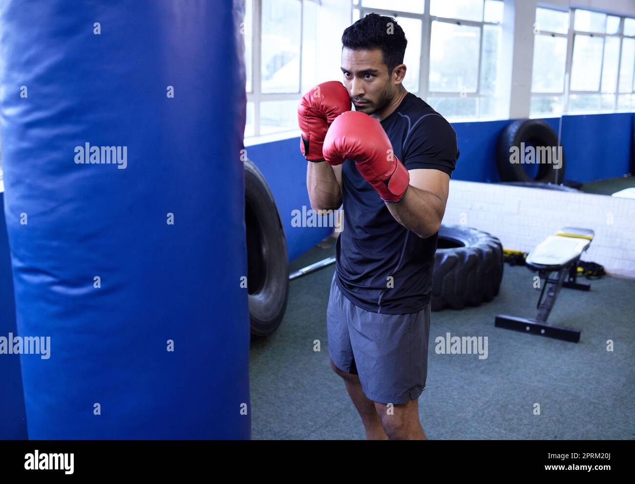 Punching my way to greatness. a young man about to start his boxing ...
