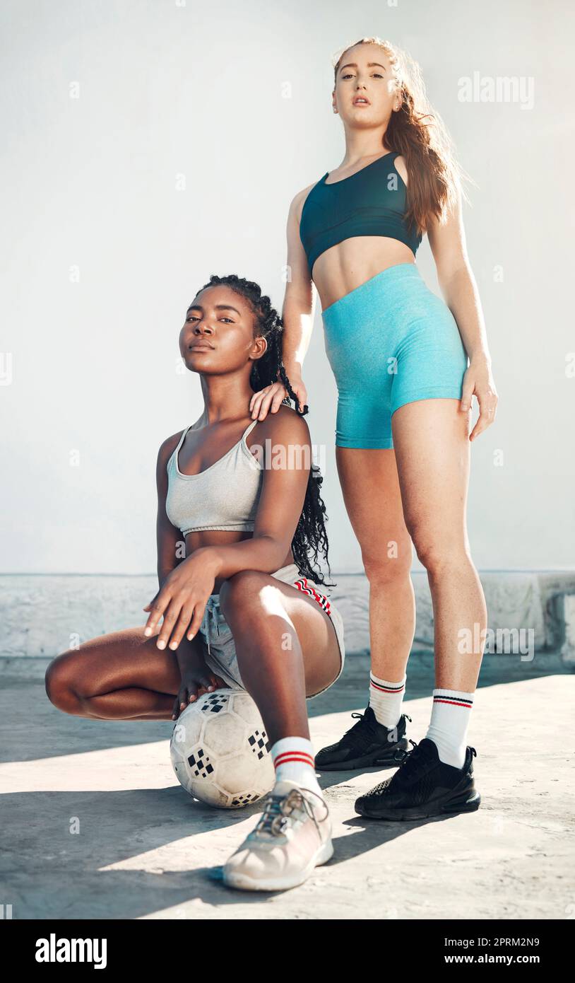 Fitness, friends and soccer ball portrait of athlete women in city for