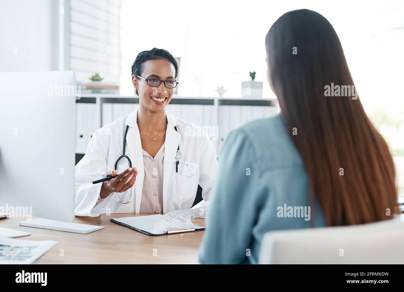 Doctor Patient Consultation Desk Candid Hi Res Stock Photography And