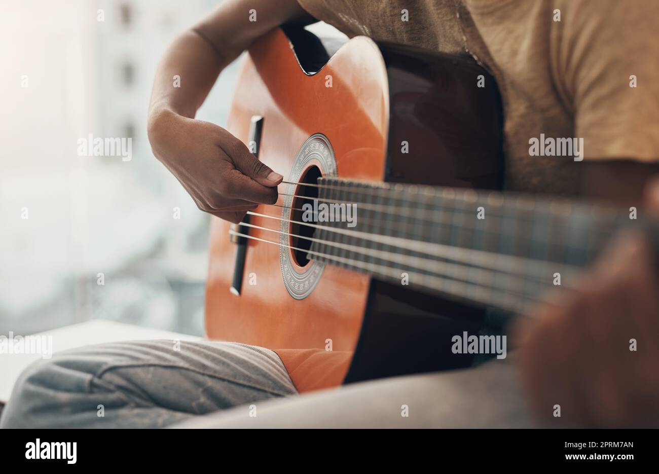 A guitar lesson is a gift that lasts a lifetime. an unrecognisable