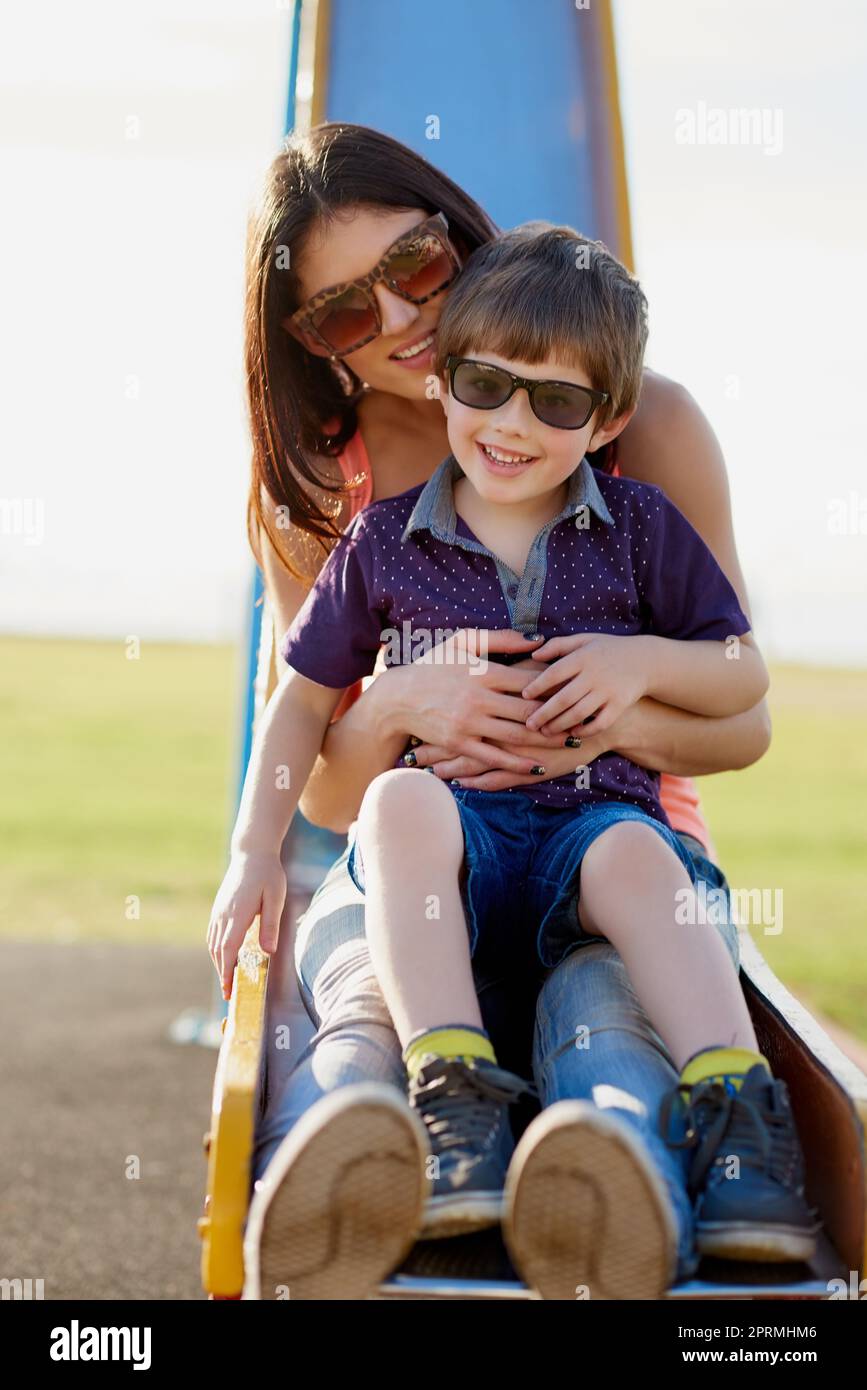 The park is our happy place. Portrait of a mother and son enjoying a day at the park together. Stock Photo