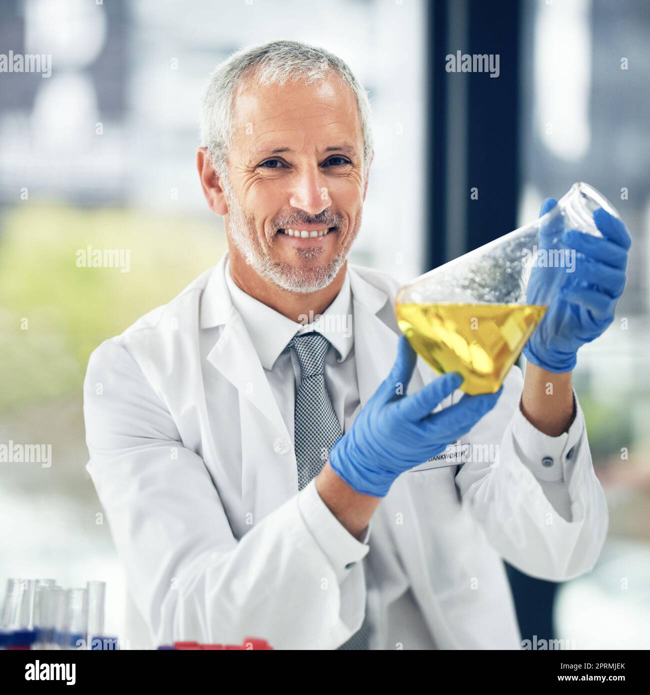 This is that cure weve all been waiting for. a scientist conducting an experiment. Stock Photo