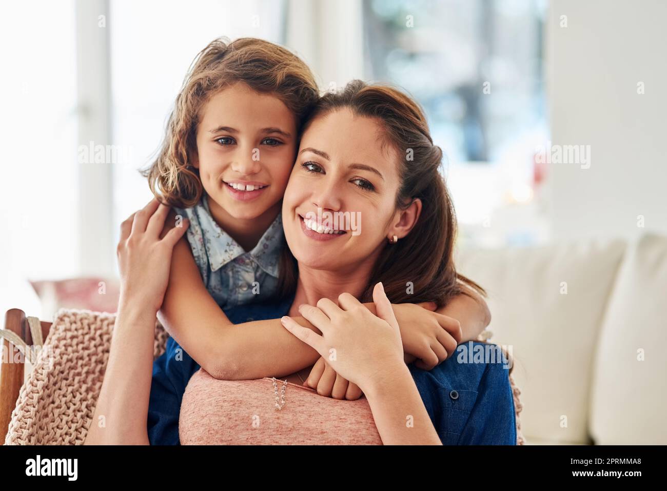 Nothing better than spending time with my best friend ever. Portrait of a mother and daughter spending some quality time together at home. Stock Photo