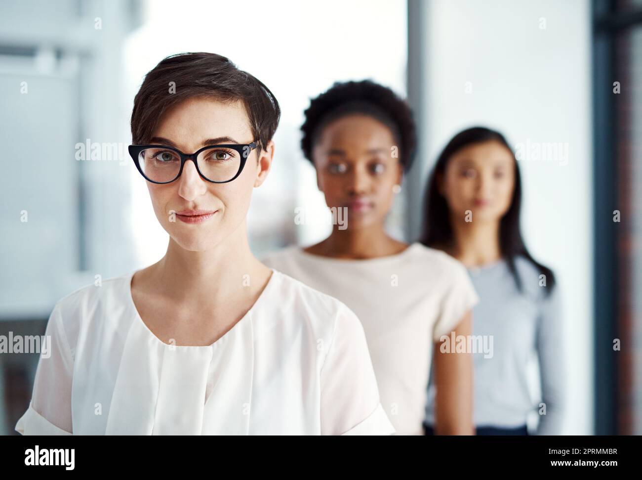 We stand together as a single unit. Portrait of a diverse team of professionals standing