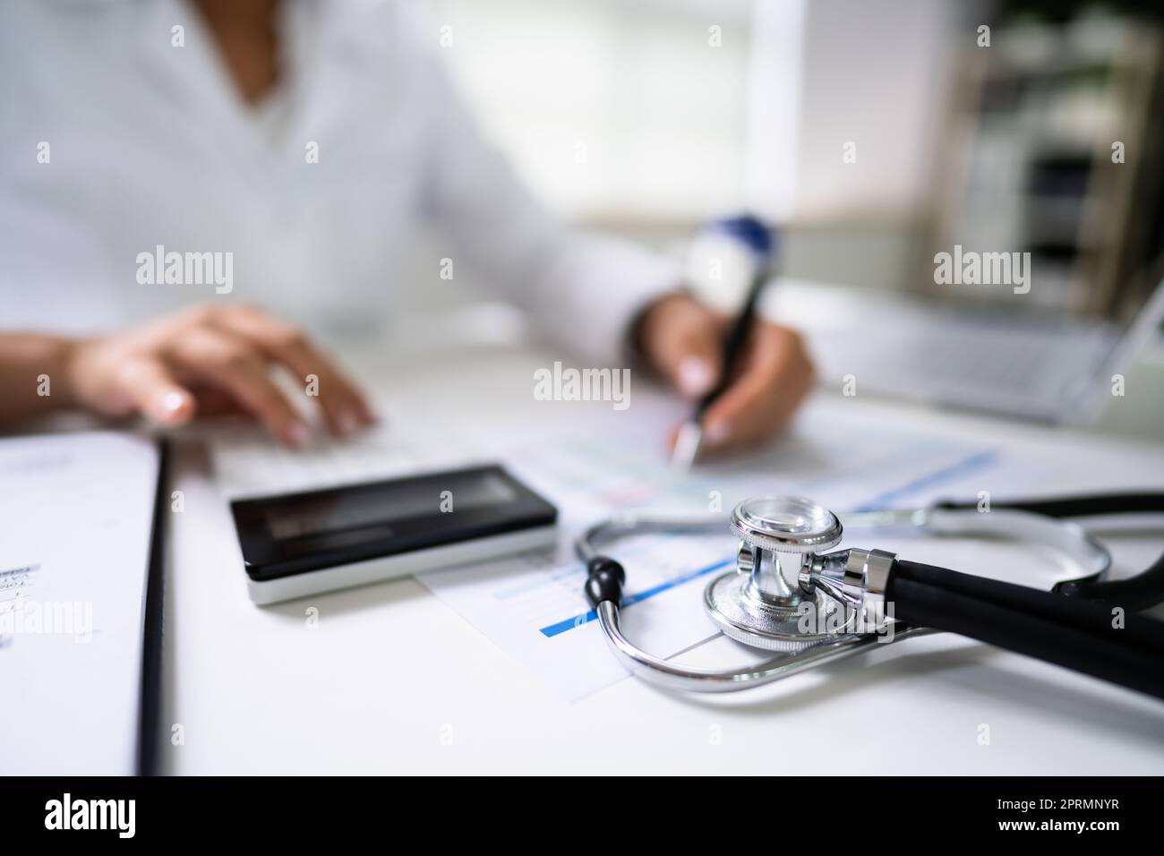 Medical Hospital Bill And Expenses Calculator Stock Photo