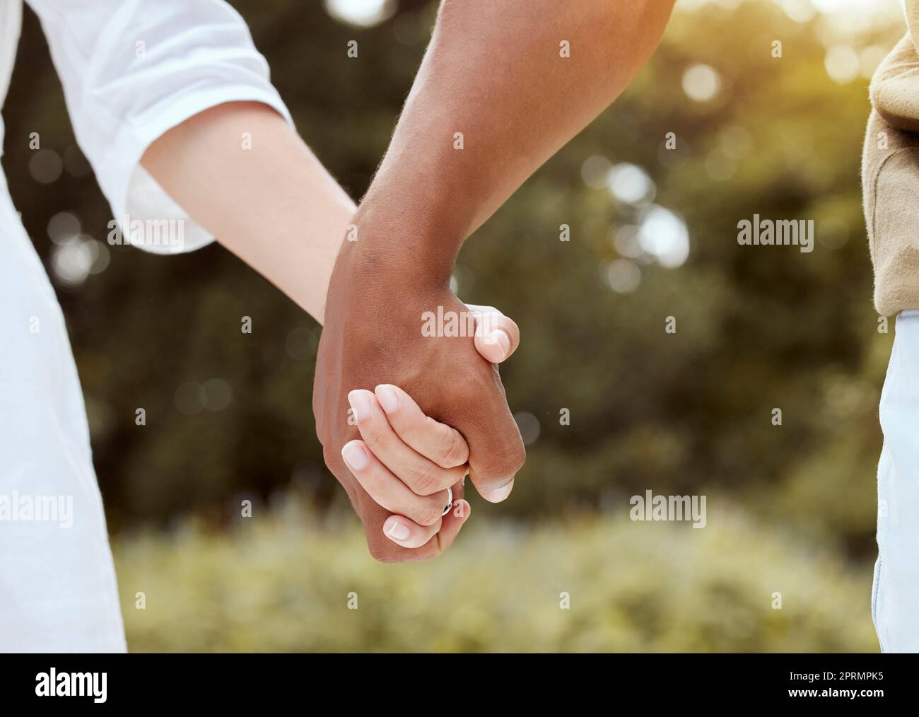 Diversity, holding hands and couple being romantic, support and being together for relationship