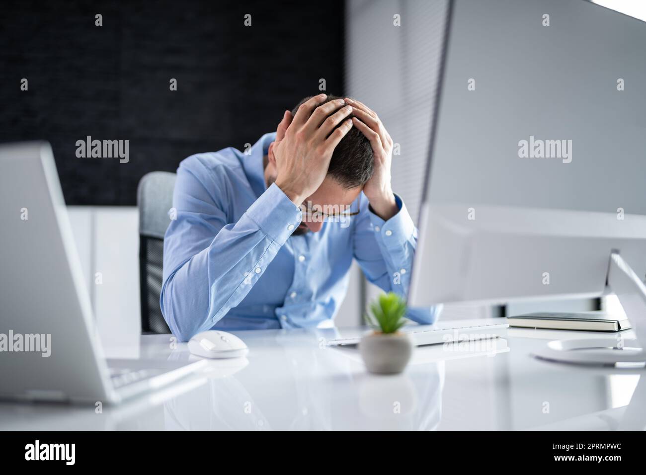 Stressed Sick Employee Man Stock Photo