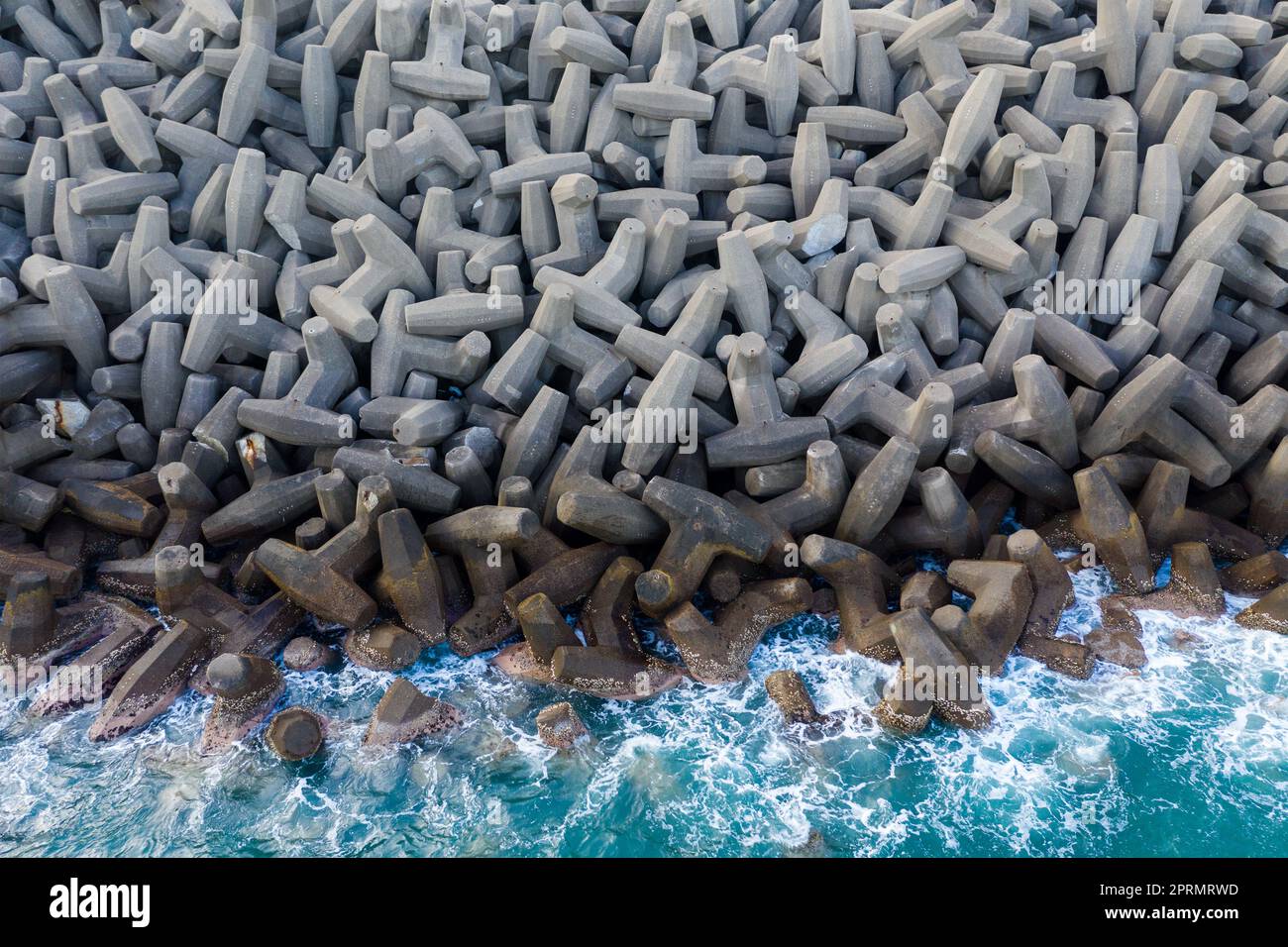 Top down view of concrete wave breaker Stock Photo - Alamy