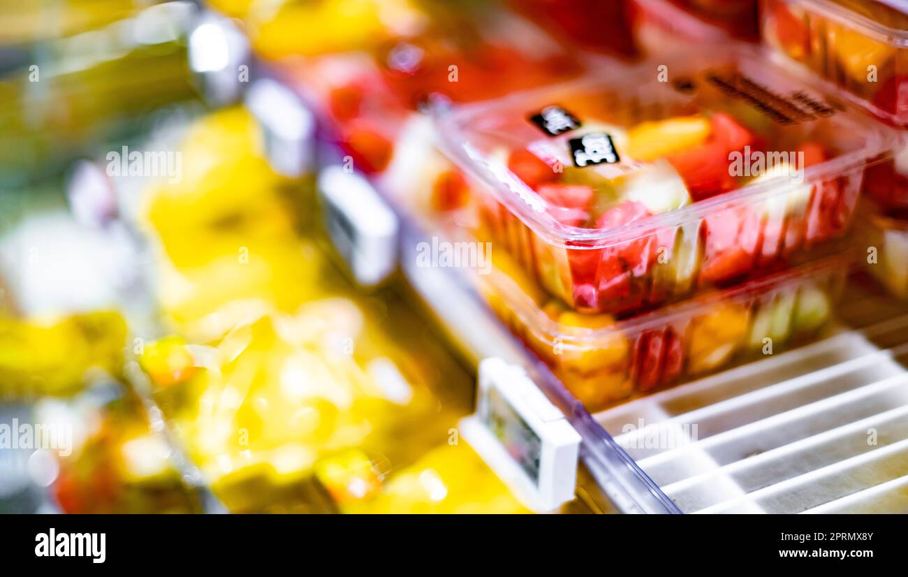 Packages with fruits displayed in a commercial refrigerator Stock Photo